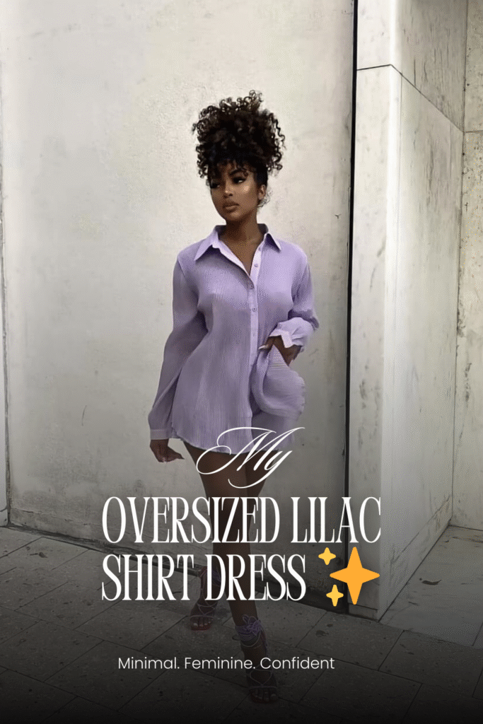 A woman wearing a flowy oversized lilac shirt dress with lace-up lavender heels and a curly updo hairstyle. A minimal, feminine summer date outfit styled for effortless charm.